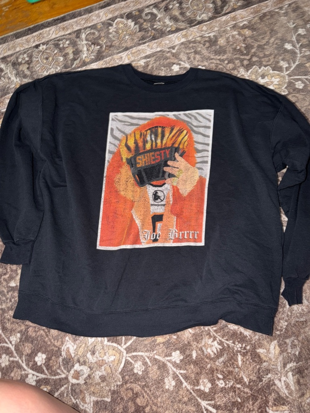 Black Graphic Crewneck Sweatshirt with Orange Hood Design